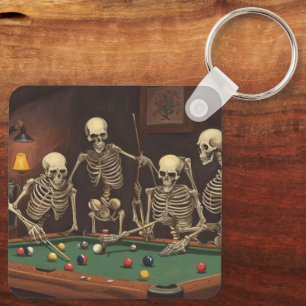 Skeletons at a bar key ring