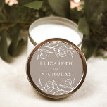 Sketched Floral Taupe Wedding Classic Round Sticker<br><div class="desc">Elegant floral wedding stickers featuring white sketched flowers and leaves with a taupe background. Personalise the sketched floral wedding stickers with your names. The floral stickers are perfect for sealing wedding envelopes,  wedding favours,  and more! Designed to coordinate with our Sketched Floral wedding collection.</div>