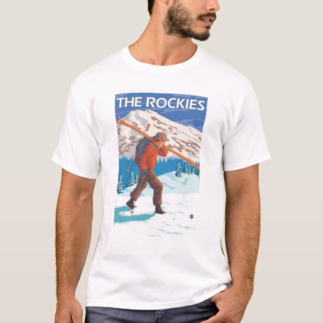 Skier Carrying Snow Skis - The Rockies T-Shirt (Front)