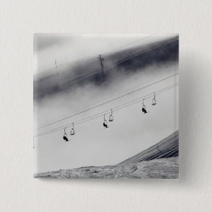 Skiers on a chair lift 15 cm square badge