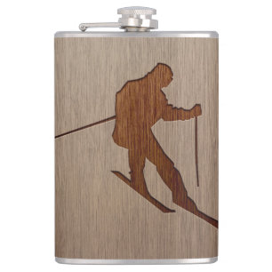 Skiing silhouette engraved on wood design hip flask