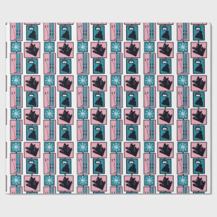Skis & equipment in pink & blue wrapping paper