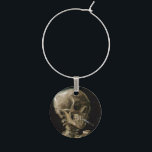 Skull with Burning Cigarette Van Gogh Goth Artwork Wine Charm<br><div class="desc">Vincent van Gogh (Dutch, 1853 - 1890) Skull of a Skeleton with Burning Cigarette, 1885–86, Oil on canvas Unframed: 32 cm × 24.5 cm (13 in × 9.6 in) Early work by Vincent van Gogh. This small painting is part of the permanent collection of the Van Gogh Museum in Amsterdam....</div>