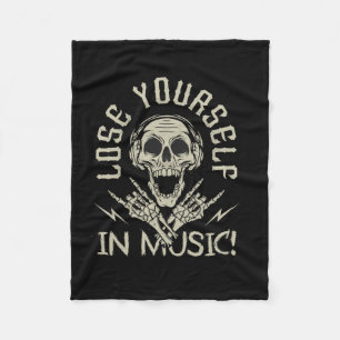 skull with headphones and skeleton hands fleece blanket