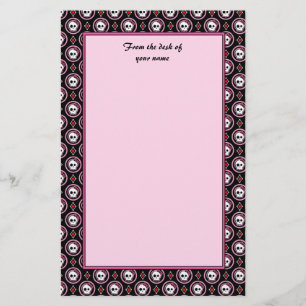 Skull with heart and bow design stationery