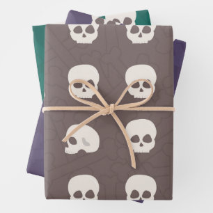 Skulls on bone background wrapping paper sheet