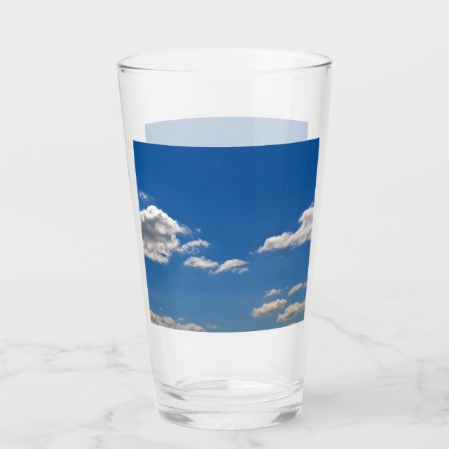 Sky is blue and white clouds are passing by   glass (Front)
