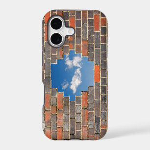 Sky through a hole in a brick wall