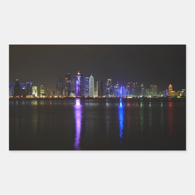 Skyline of Doha, Qatar at night rectangle sticker (Front)