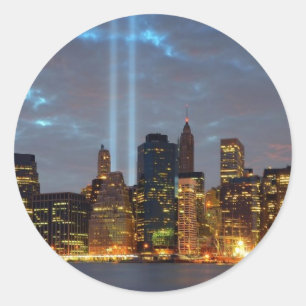 Skyline view of city in night. classic round sticker