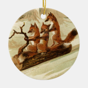 Sledding Foxes Ceramic Ornament