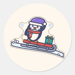Sledding Season Penguin on a Red Sled Classic Round Sticker