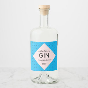 Sleek blue personalised gin bottle label