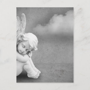 Sleeping angel on grey background, angelic art postcard