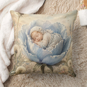 Sleeping baby in blue flower cushion