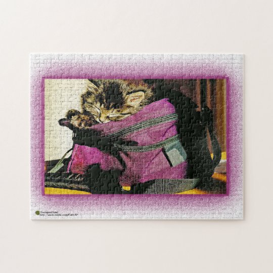Sleeping Kitten In A Burgundy Purse Jigsaw Puzzle