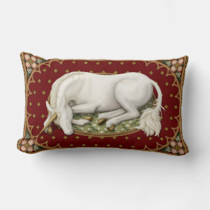 Sleeping Unicorn on a Dark Red Floral Lumbar Cushion