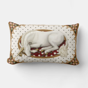 Sleeping Unicorn on a Polka Dot and Floral Lumbar Cushion