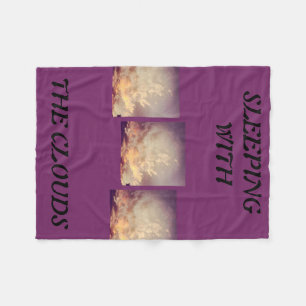 SLEEPING WITH CLOUDS FLEECE BLANKET