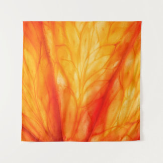 Slice of citrus fruit with backlit, abstract macro tapestry