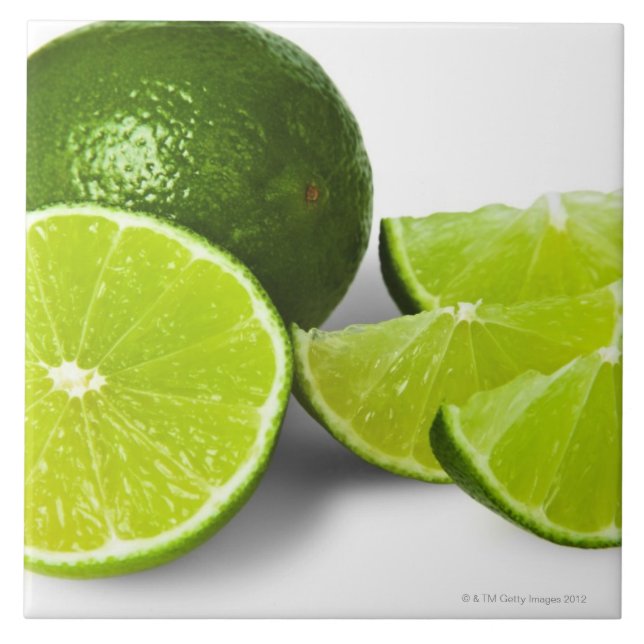 Sliced lime wedge, on white background, cut out ceramic tile (Front)