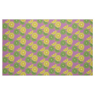 Sliced , quartered lemons and limes purple fabric