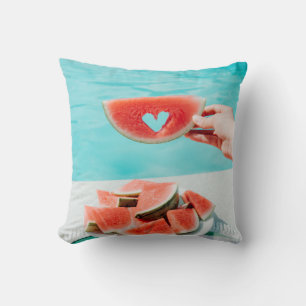 Sliced watermelon on white paper cushion
