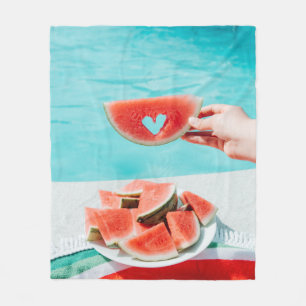 Sliced watermelon on white paper fleece blanket