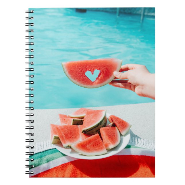 Sliced watermelon on white paper notebook (Front)