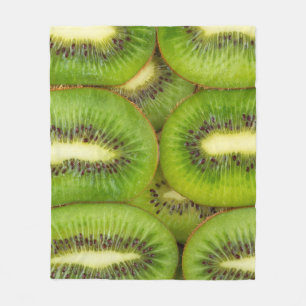 Slices of fresh and ripe kiwi fruit in rowsbrown,c fleece blanket