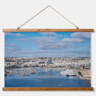 Sliema harbor with modern buildings and boats hanging tapestry