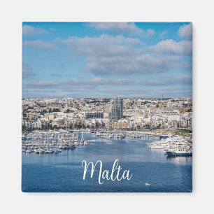 Sliema harbour with modern buildings and boats magnet