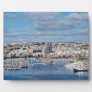 Sliema harbour with modern buildings and boats plaque