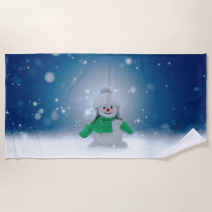 SlipperyJoe's adorable Christmas snowman character Beach Towel