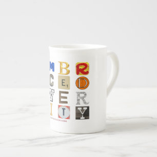 SlipperyJoe's embraces diversity cut-out letters c Bone China Mug