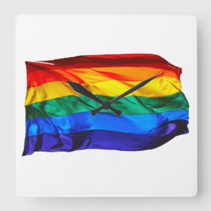 SlipperyJoe's gay pride flag waving pride colours  Square Wall Clock