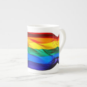 SlipperyJoe's gay pride flag waving red orange yel Bone China Mug