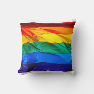 SlipperyJoe's gay pride flag waving red orange yel Cushion