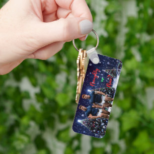 SlipperyJoe's glowing Christmas trees two muscular Key Ring