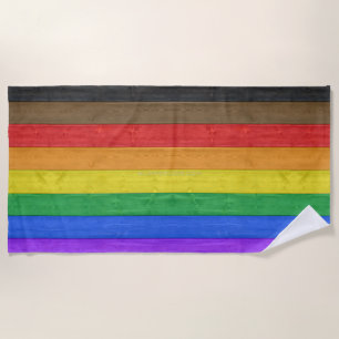 SlipperyJoe's Inclusive gay pride flag textured ru Beach Towel