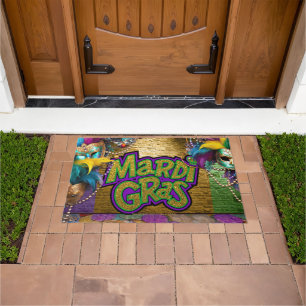 SlipperyJoe's Mardi Gras-themed graphic doubloons Doormat