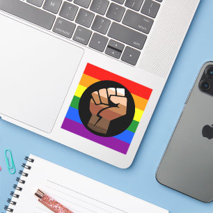 SlipperyJoe's queer people colour flag raised fist