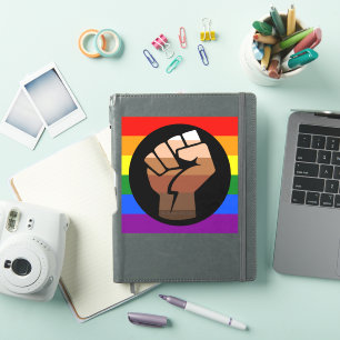 SlipperyJoe's queer people colour flag raised fist