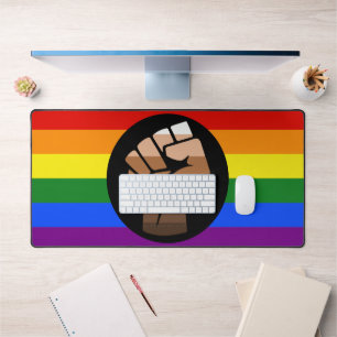 SlipperyJoe's queer people colour flag raised fist Desk Mat