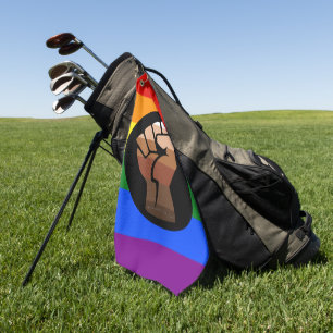 SlipperyJoe's queer people colour flag raised fist Golf Towel