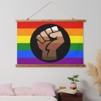 SlipperyJoe's queer people colour flag raised fist
