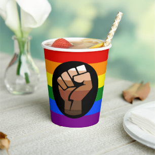 SlipperyJoe's queer people colour flag raised fist Paper Cups