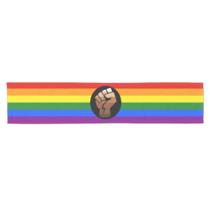 SlipperyJoe's queer people colour flag raised fist Short Table Runner