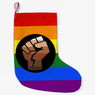 SlipperyJoe's queer people colour flag raised fist Small Christmas Stocking