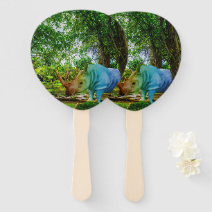 SlipperyJoe's rhinoceros lush tropical setting pri Hand Fan